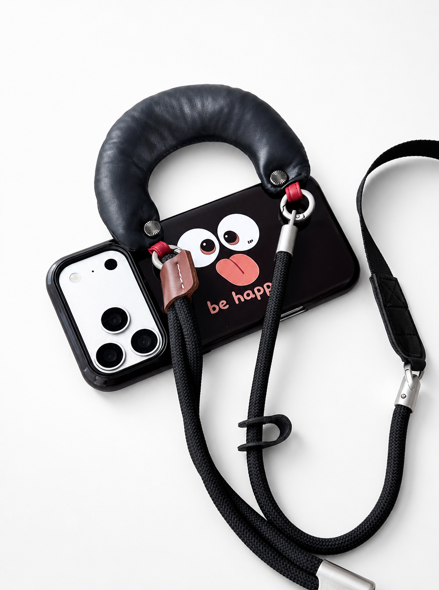 SSEGY Padded Crossbody Phone Case | Hands-free iPhone case featuring a detachable shoulder strap and shock-absorbing protection.